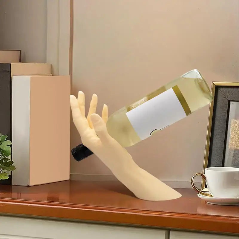 Suporte Flutuante para vinhos em formato de Mão.