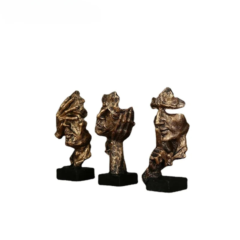 Estatueta abstrata "O Silêncio é Ouro" de resina.